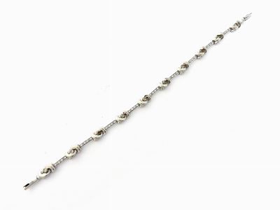 Braccialetto in Oro Bianco con Diamanti Incolori e Brown