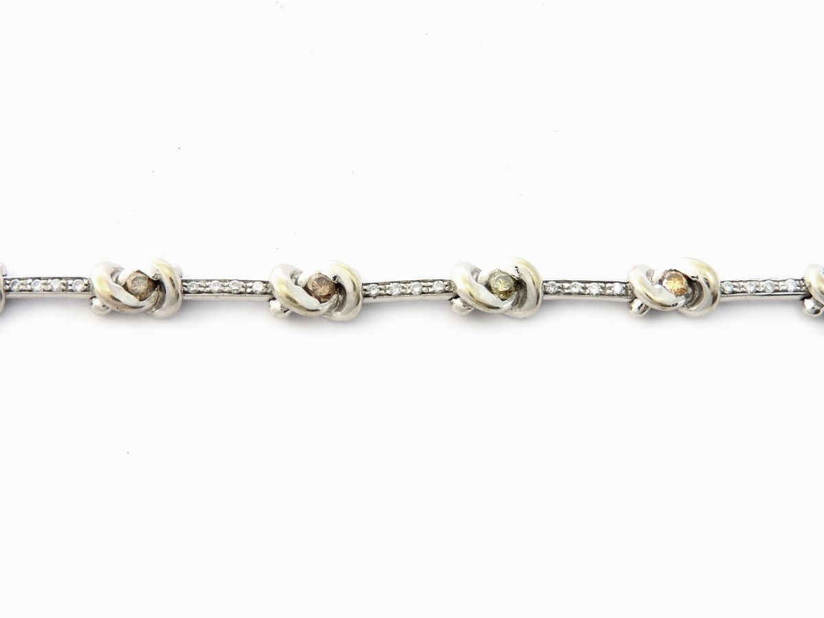 Braccialetto in Oro Bianco con Diamanti Incolori e Brown