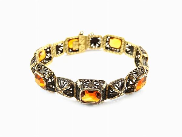 Yellow gold and silver panels bracelet with citrine quartzes