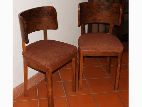Serie di sei sedie a pozzetto in radica di olivo