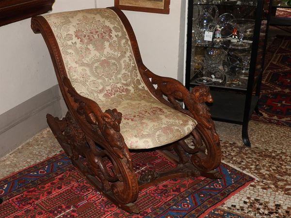 A Walnut Rocking Chair  (late 19th Century)  - Auction The Riz Ortolani and Katyna Ranieri collection / Forniture and Art Objects - III - III - Maison Bibelot - Casa d'Aste Firenze - Milano
