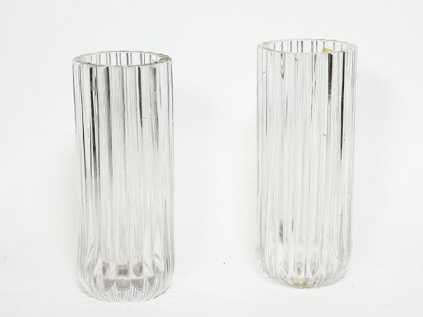 A pair of uncoloured blown glass vases