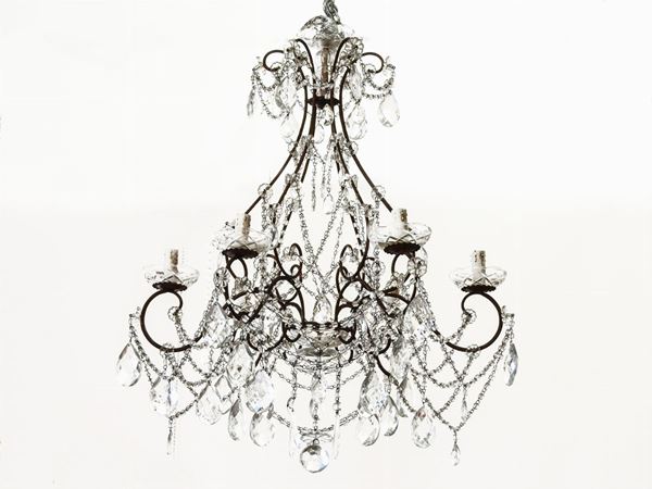 A Gilded Metal Chandelier  (early 20th Century)  - Auction The Riz Ortolani and Katyna Ranieri collection / Forniture and Art objects  - II - II - Maison Bibelot - Casa d'Aste Firenze - Milano