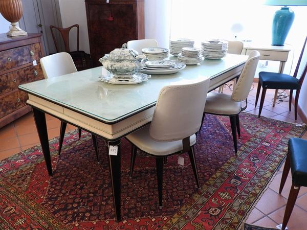 Umberto Mascagni : A Wood and Skai and Metal Dining Table with Four Chairs  (1950s)  - Auction The Riz Ortolani and Katyna Ranieri collection / Forniture and Art objects  - II - II - Maison Bibelot - Casa d'Aste Firenze - Milano