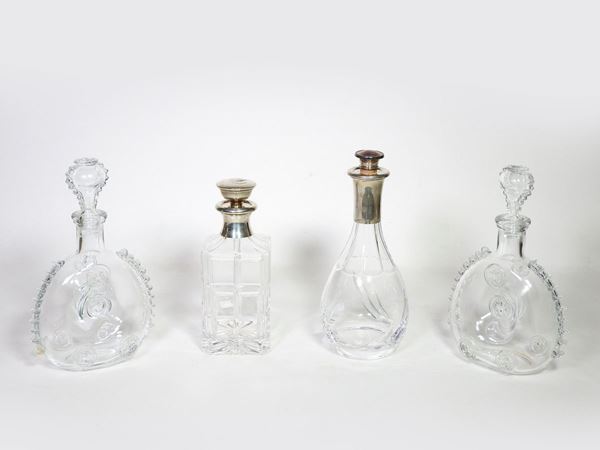 Four Glass Bottles  - Auction House sale: Art and Design in "Horto Antico" villa - III - III - Maison Bibelot - Casa d'Aste Firenze - Milano