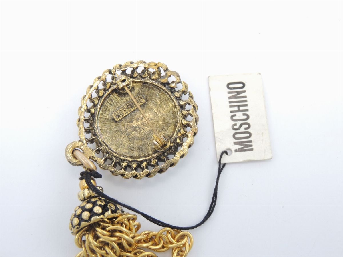 Spilla in Metallo Dorato, Moschino