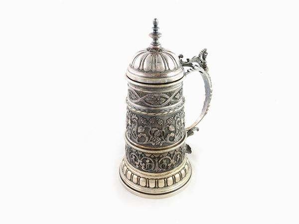 A large silver tankard