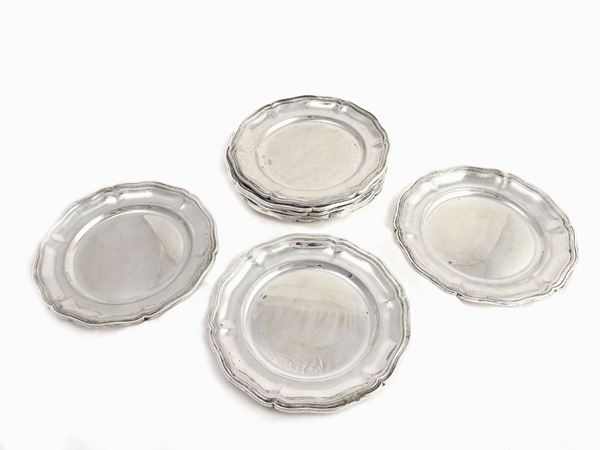 A Set of Eight Silver Bread Coasters