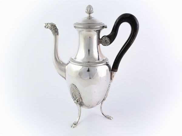 A silver coffee pot