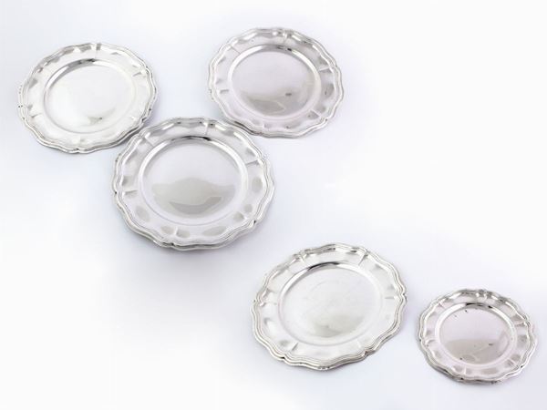 A group of silver trays