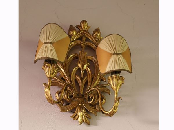 A Couple of Giltwood Appliques