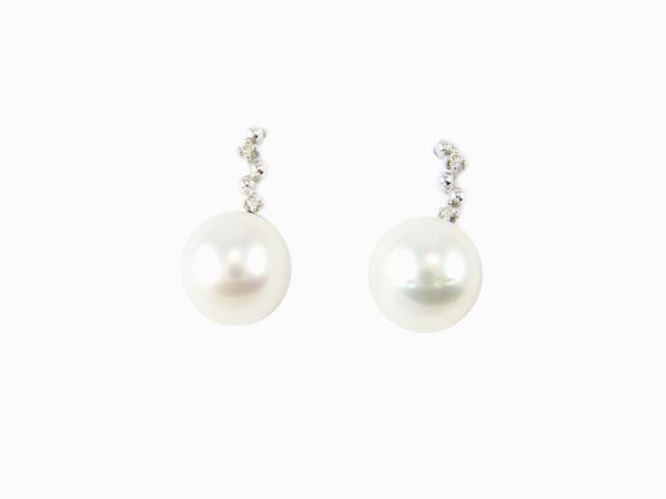 14KT white gold ear pendants with small diamonds and Akoya cultured pearls