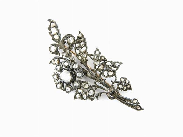 Yellow gold and silver brooch with diamonds