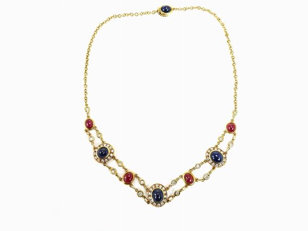 Yellow gold necklace with diamonds, sapphires and rubies