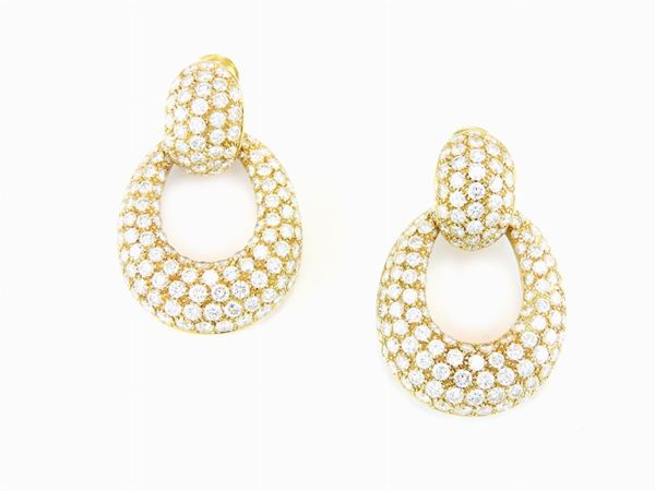 Yellow gold ear pendants with diamonds