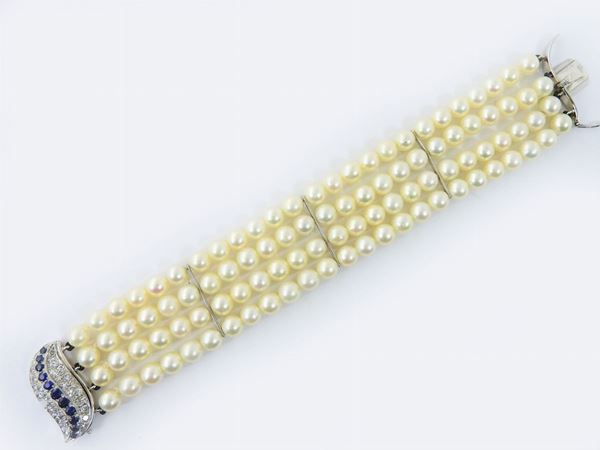 Bracciale in oro bianco, diamanti, perle Akoya e zaffiri