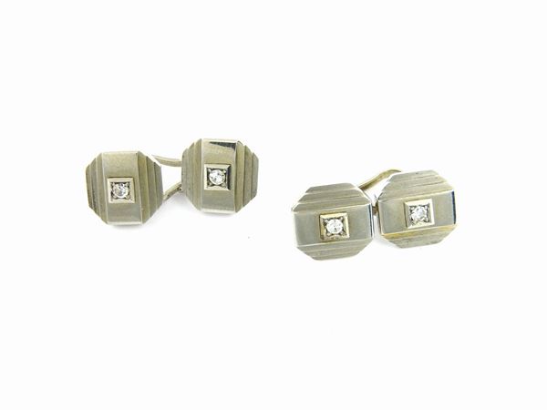 White gold cuff links with diamonds