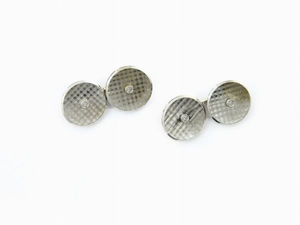White gold cuff links with diamonds