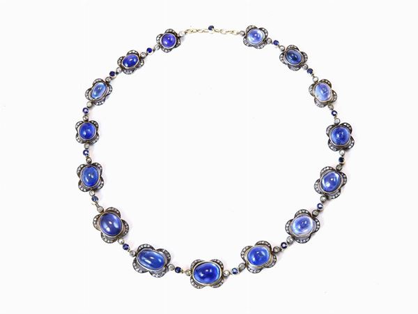 Yellow gold and silver necklace with diamonds and natural sapphires