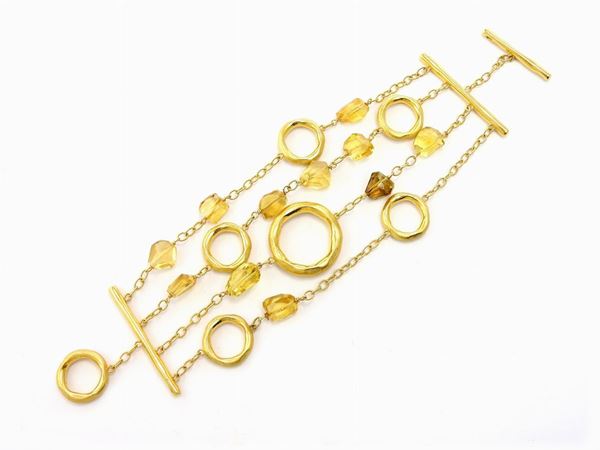 Yellow gold Calgaro bracelet with diamonds and citrine quartzes