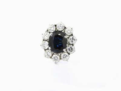 Anello a Margherita in Oro Bianco con Diamanti e Zaffiro