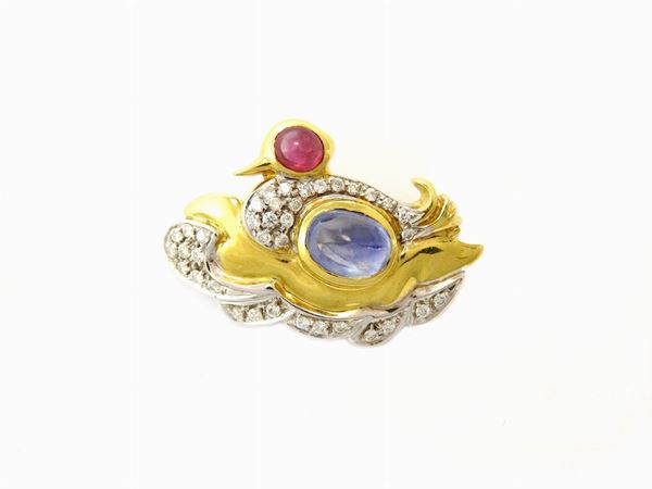 White and yellow gold animalier-shaped brooch with diamonds, sapphire and ruby