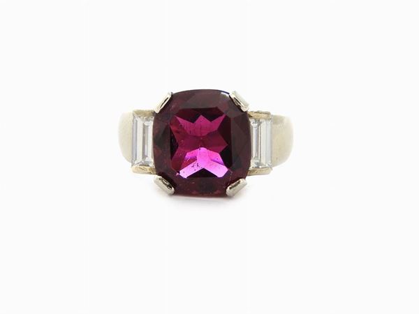 White gold ring with diamonds and rubellite tourmaline