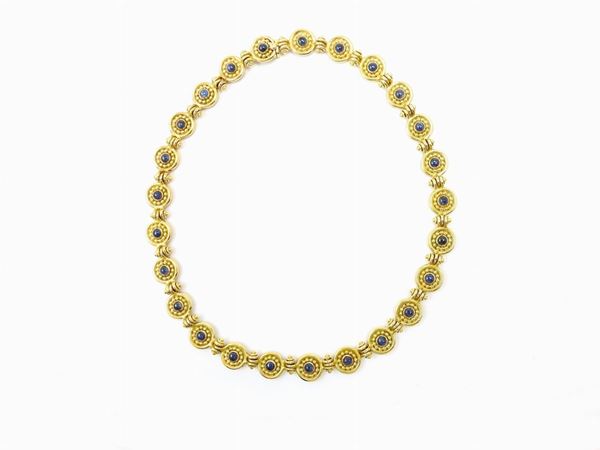 Yellow gold choker with diamonds and sapphires