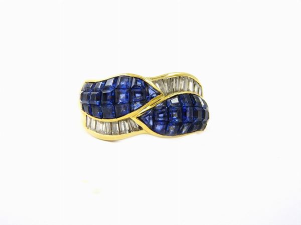 Yellow gold ring with diamonds and sapphires