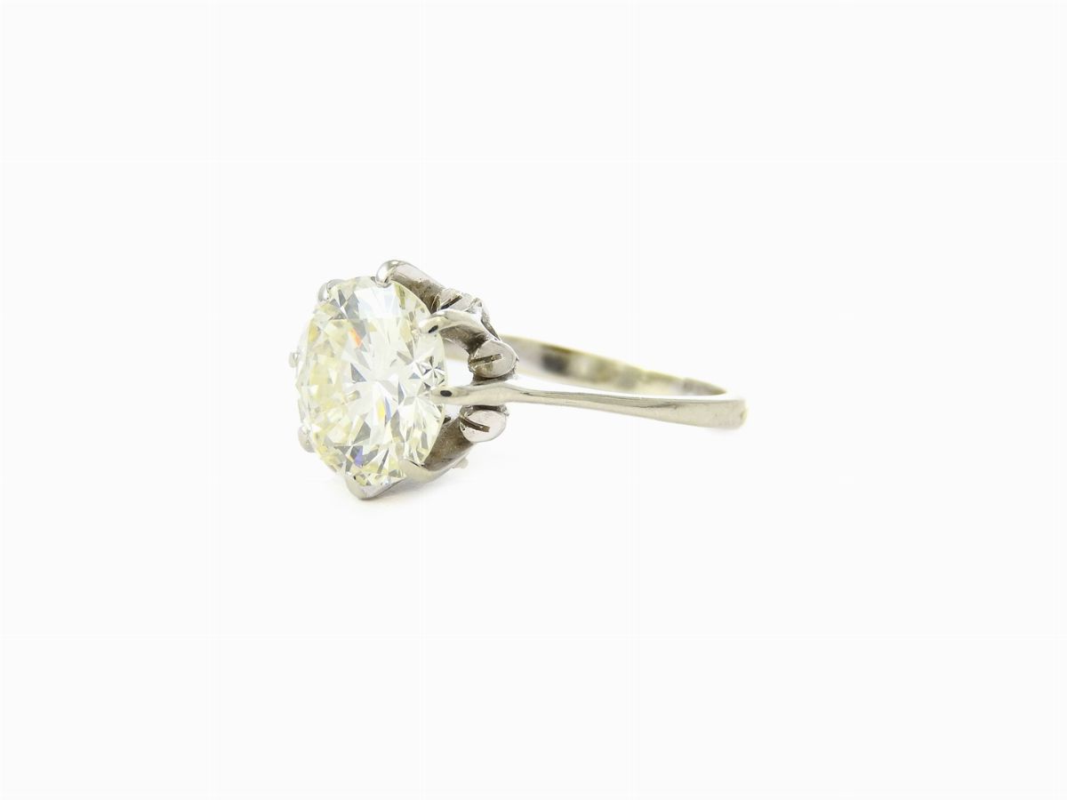 Anello Solitario in Oro Bianco con Diamante