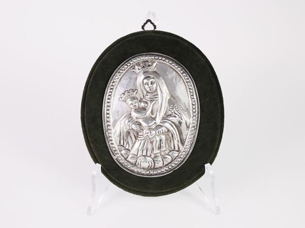 A devotional silver plaque