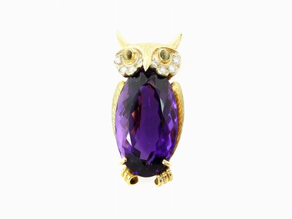 Yellow gold animalier-shaped brooch with diamonds, amethyst quartz and tiger's eyes