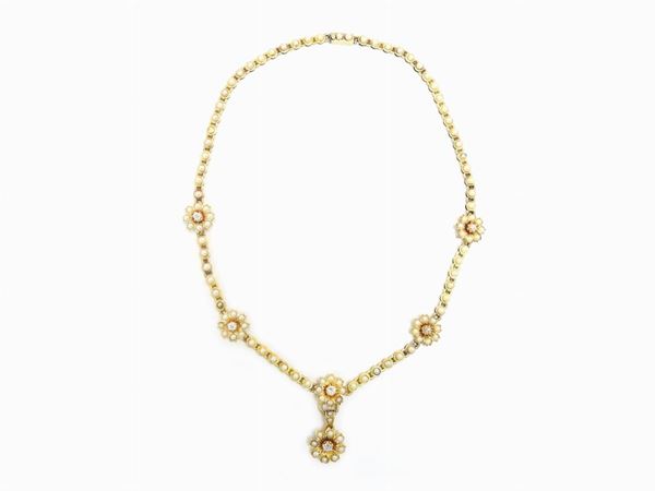 Yellow gold necklace with diamonds and half pearls