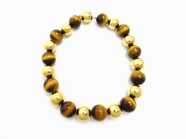 Yellow gold big necklace with tiger's eye