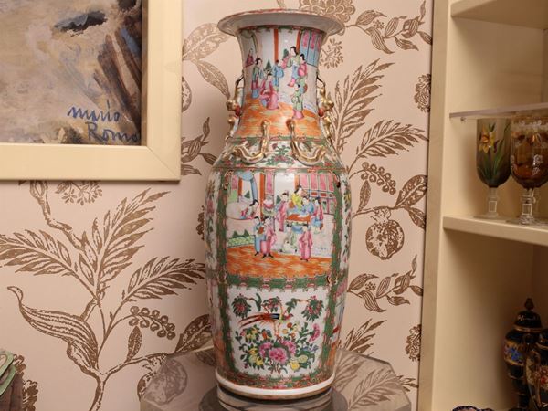 A couple of polychrome porcelain vases