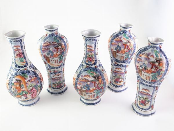A group of five polychrome porcelain vases