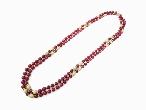 Two strands white and yellow gold necklace with diamonds and rubies