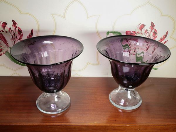 A couple of glass vases
