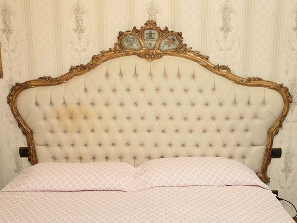 A Carved Giltwood Double Headboard