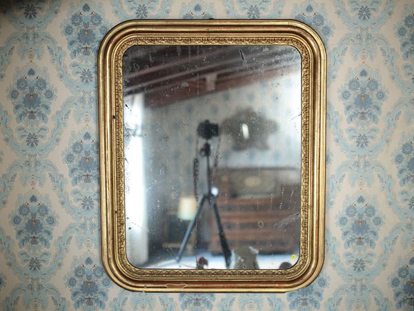 A pastiglia and giltwood mirror