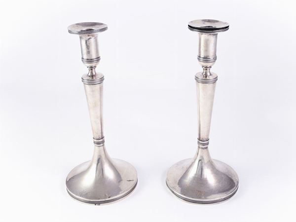 A couple of silver candelabras  (Trieste, 1825-1866)  - Auction House Sale: Furniture and Paintings from Villa Roseto - Florence - III - III - Maison Bibelot - Casa d'Aste Firenze - Milano