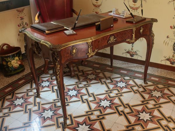A rosewood writing table