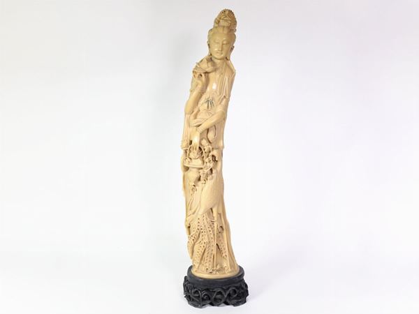 A faux ivory figure