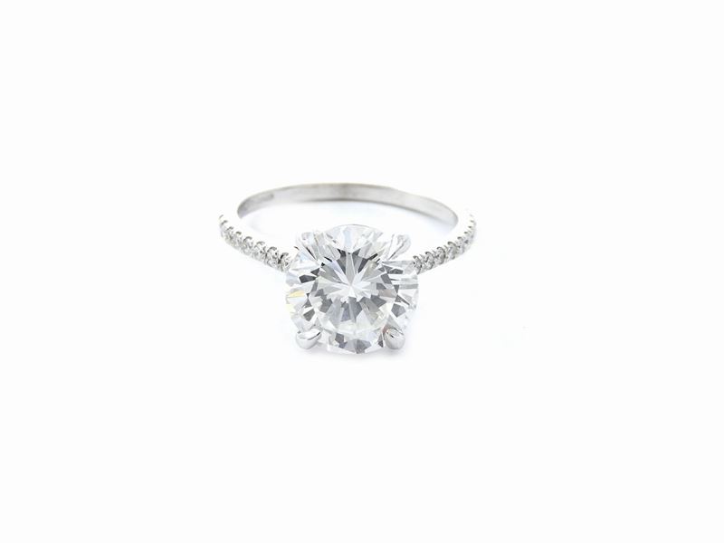 Anello Solitario in Oro Bianco e Diamanti