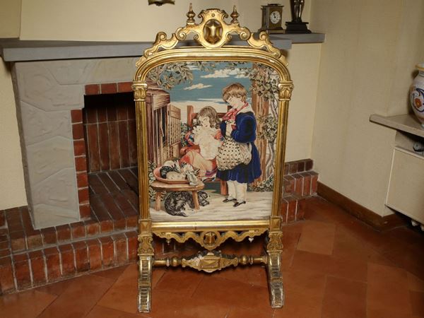 A carved and gilded wood fire retardant  (second half of 19th century)  - Auction House Sale: Furniture and Paintings from Villa Roseto  - Florence - II - II - Maison Bibelot - Casa d'Aste Firenze - Milano