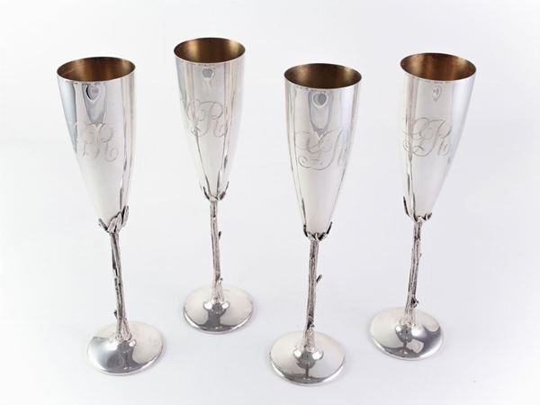 A group of twelve sterling silver flutes