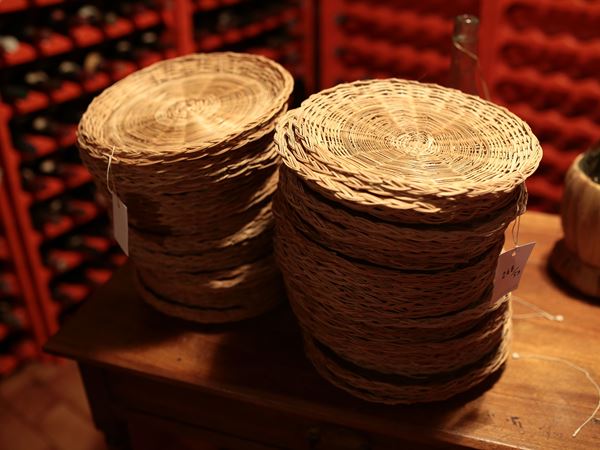 A group of wicker plates