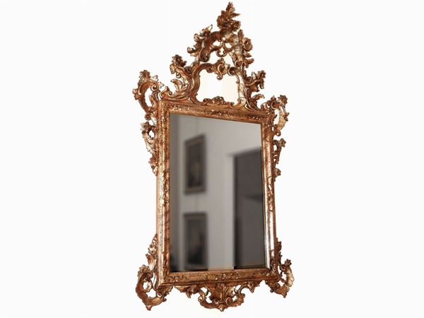 A carved and giltwood mirror
