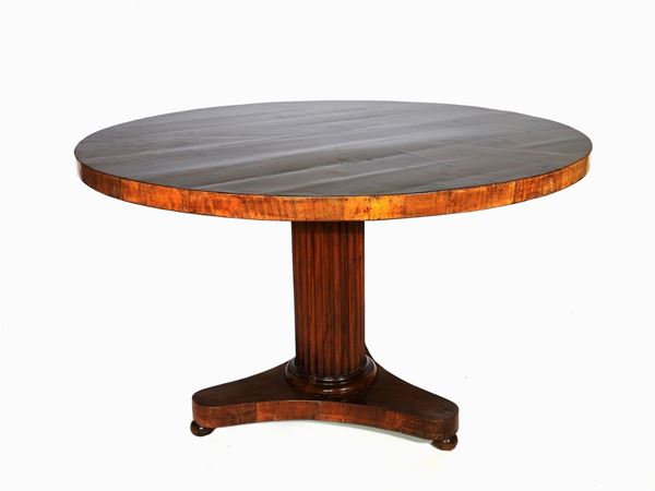 A walnut veenered table