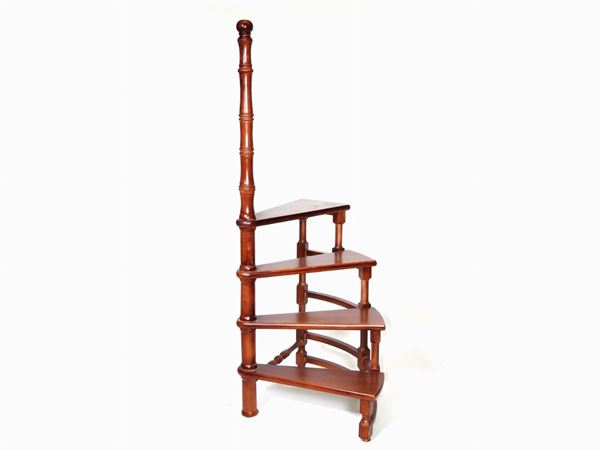 A mahogany library ladder